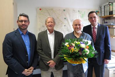 Dr. Stefan Wachs gratuliert Christoph Klawczynski. Mit dabei Jochen Kemkes und Rene Pommerin. (von rechts nach links)